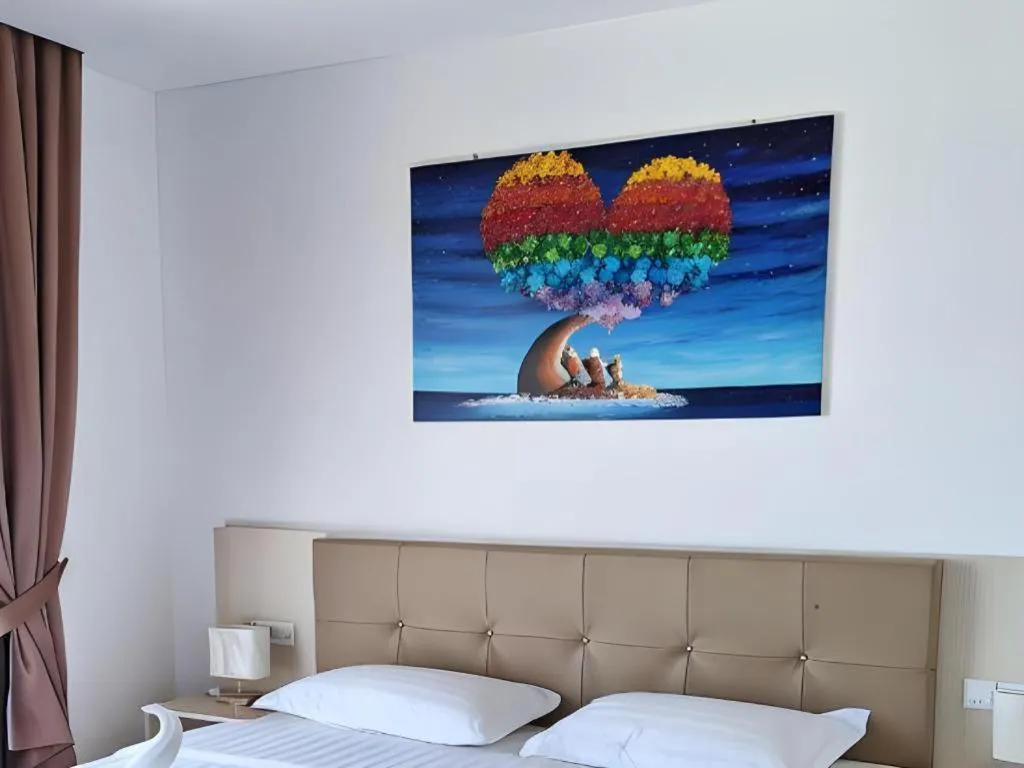 Bed in Sand Bay Resort Semporna