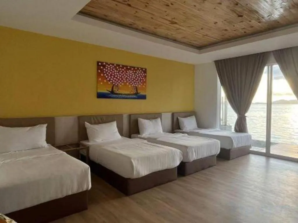 Bed in Sand Bay Resort Semporna