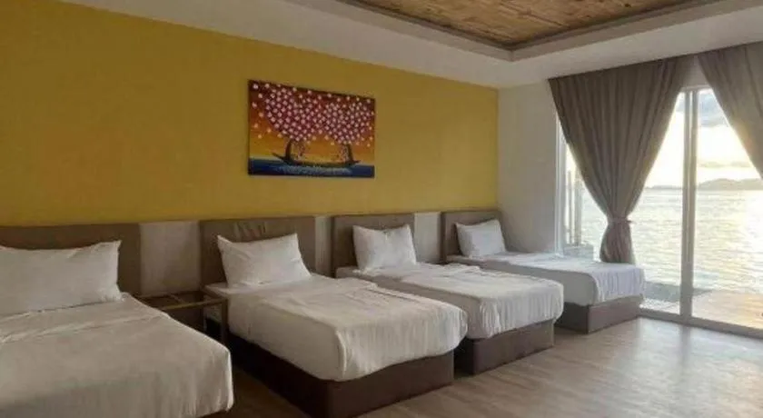 Bed in Sand Bay Resort Semporna