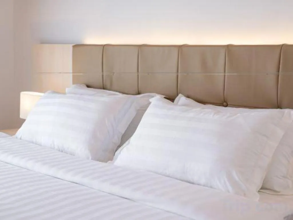 Bed in Sand Bay Resort Semporna