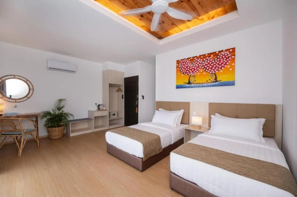 Bed in Sand Bay Resort Semporna