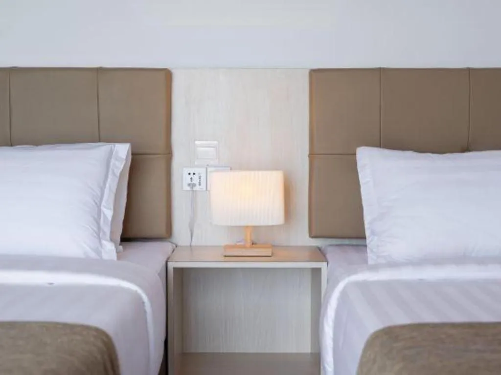 Bed in Sand Bay Resort Semporna