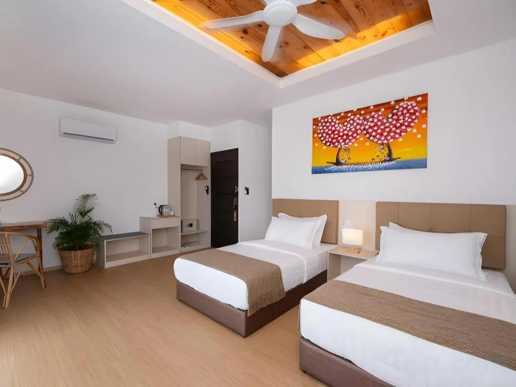 Bed in Sand Bay Resort Semporna