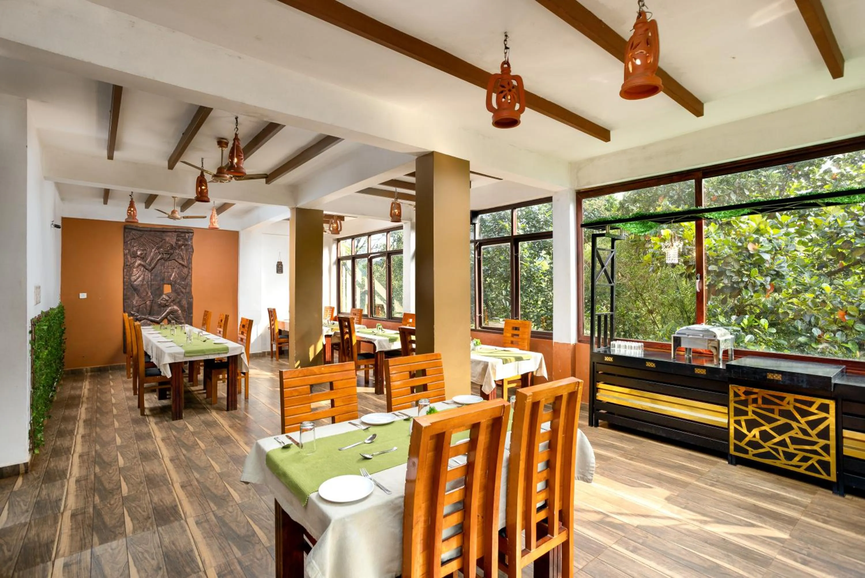 Dining area in Lakkidi Village Resort Wayanad