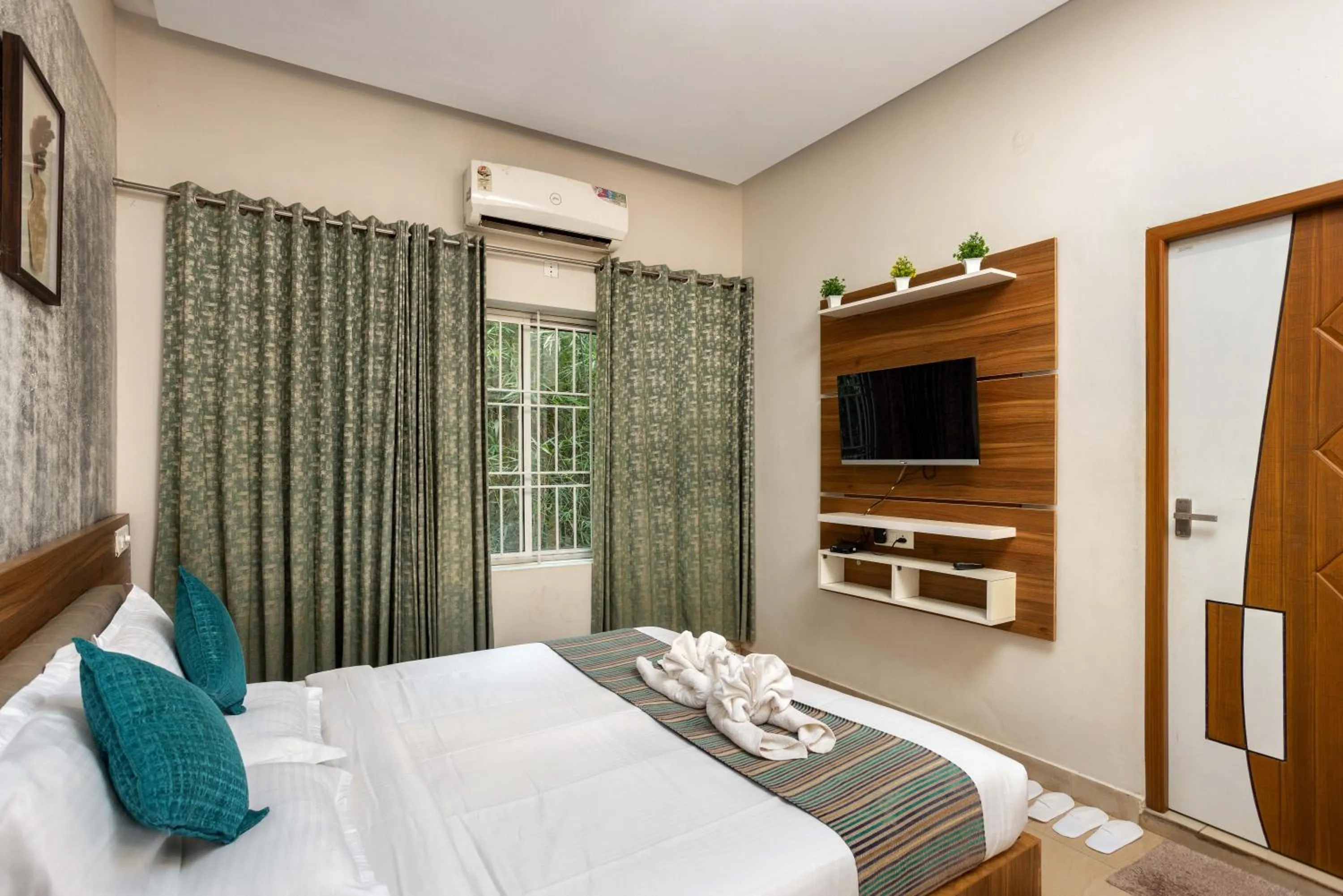 Bed in Lakkidi Village Resort Wayanad