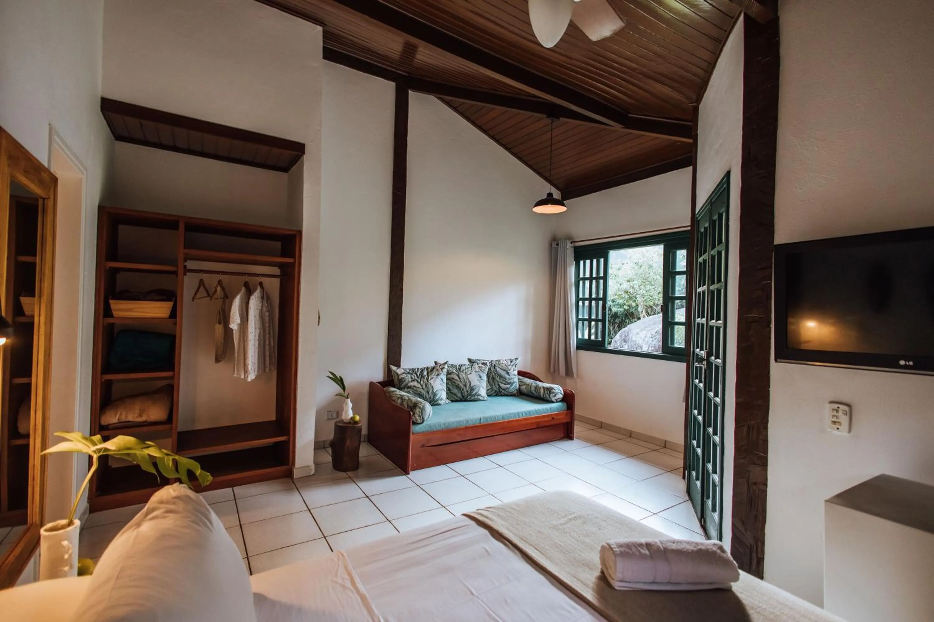 Bed in Pousada Vila das Pedras