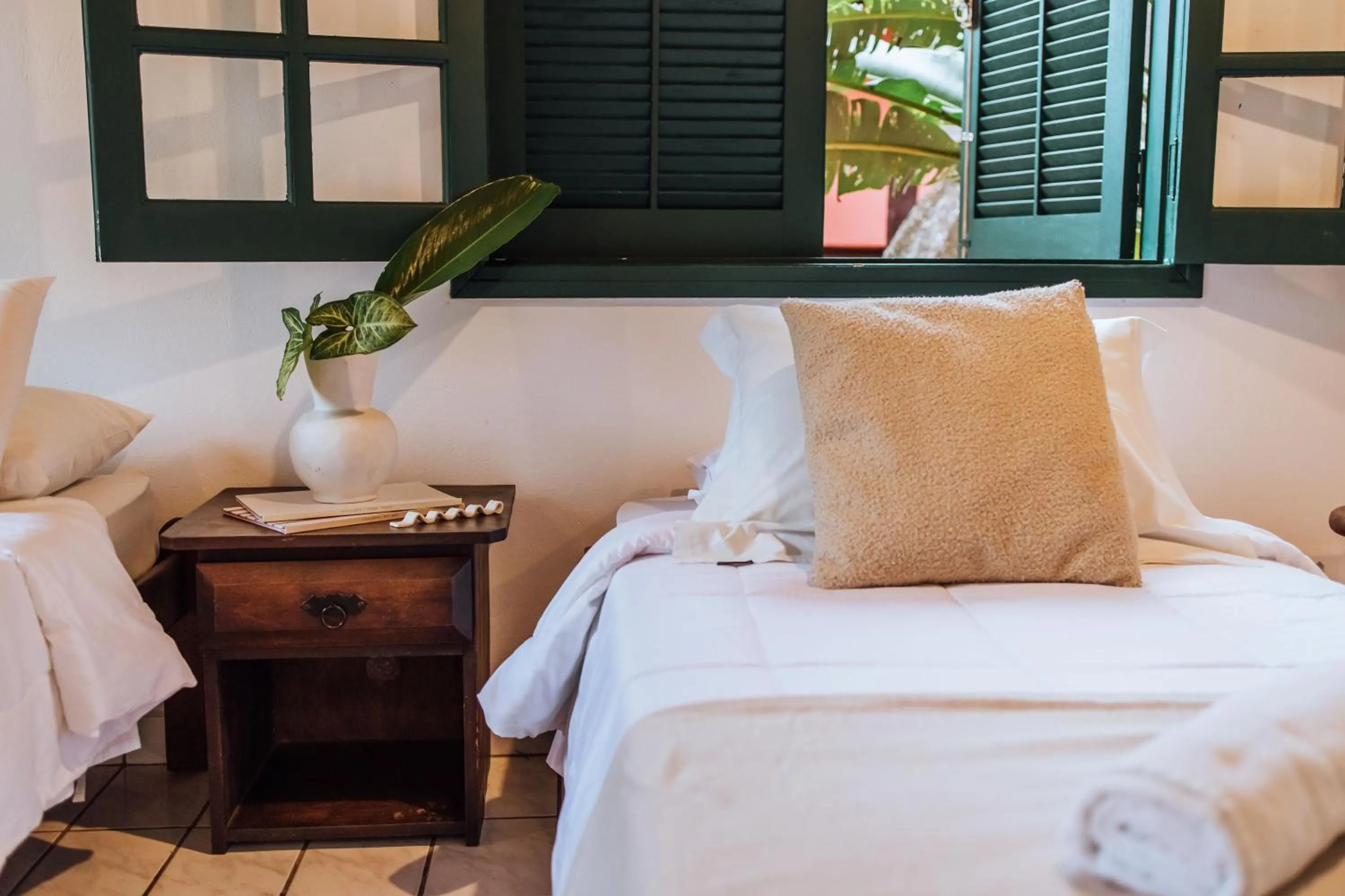 Bed in Pousada Vila das Pedras
