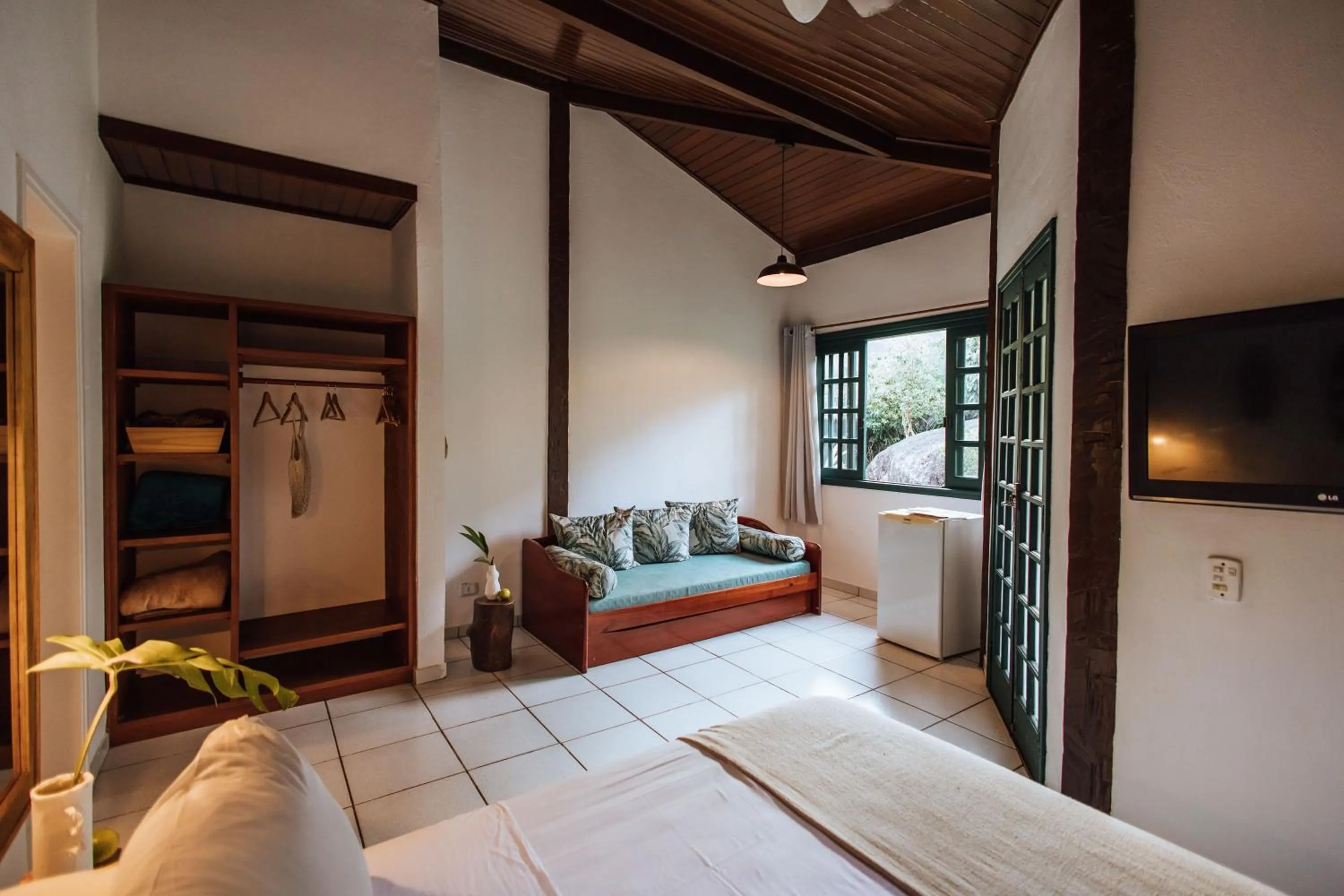 Bed in Pousada Vila das Pedras