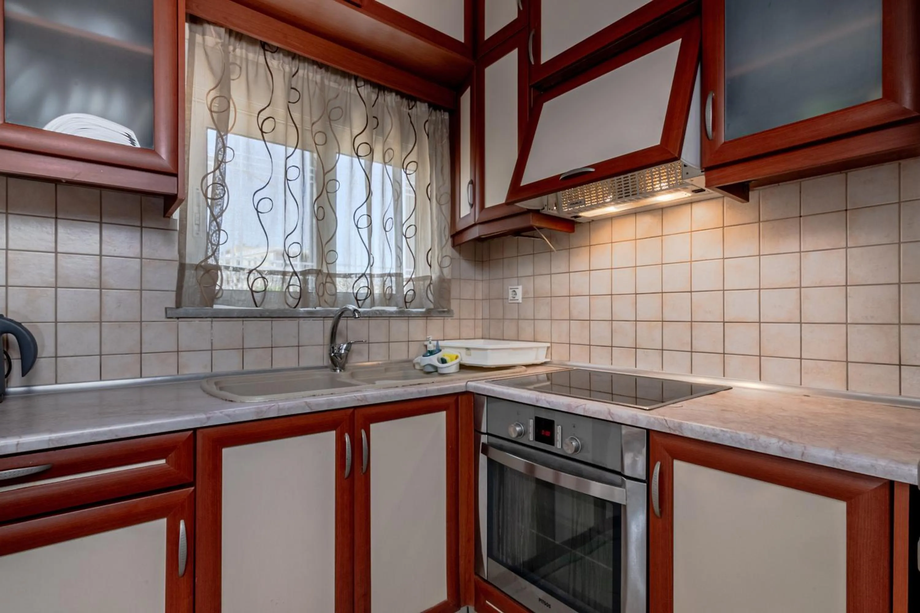 Kitchen or kitchenette in Alena Apartments