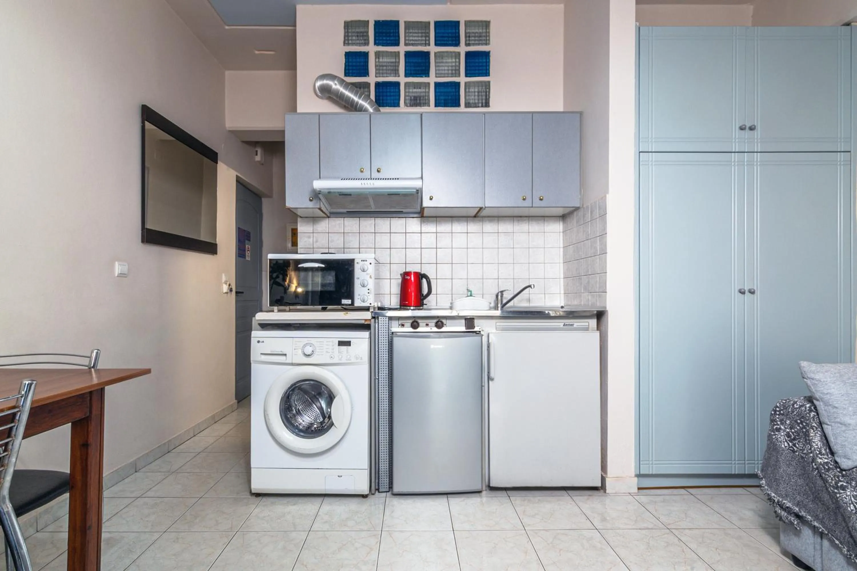 Kitchen or kitchenette in Alena Apartments