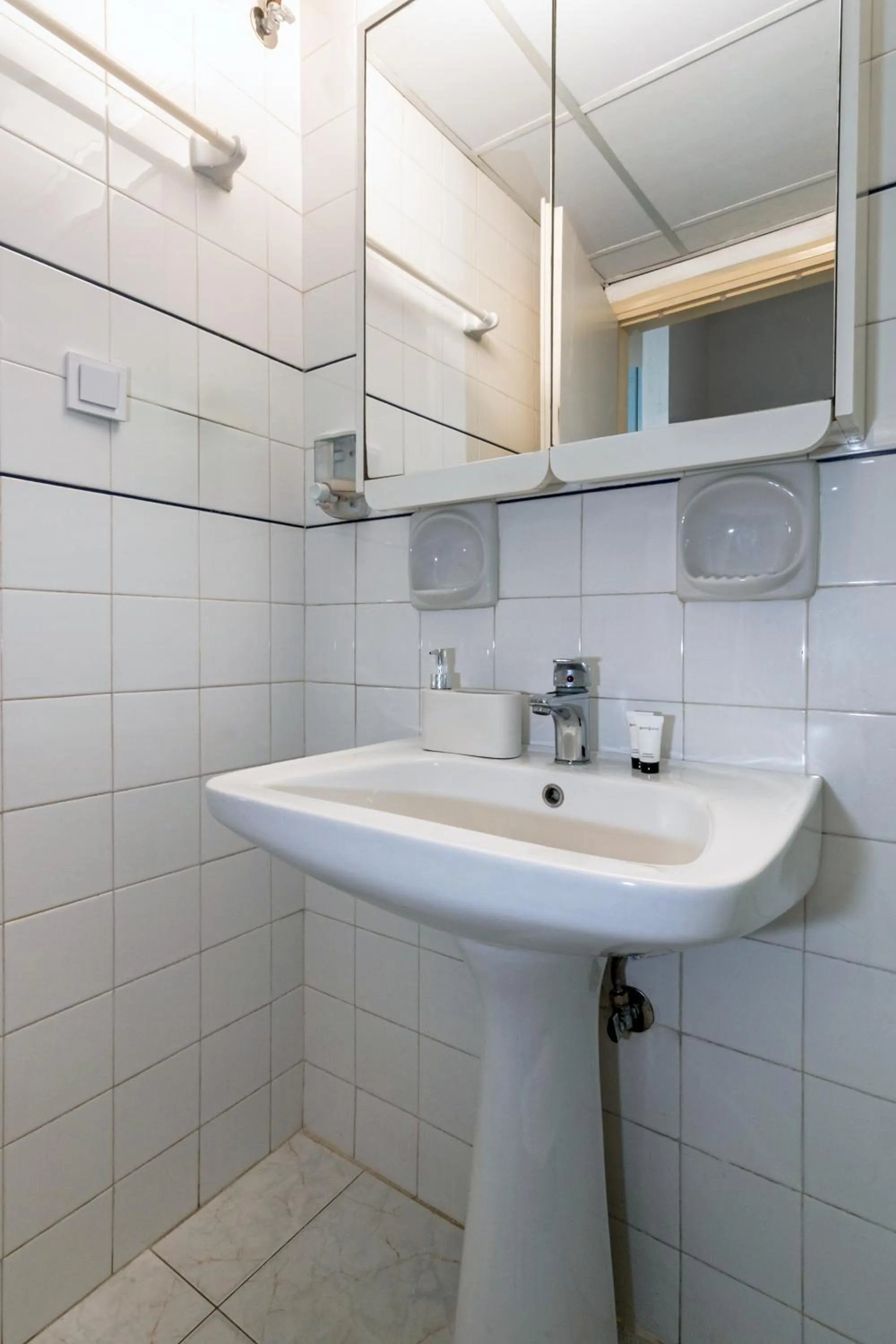 Bathroom in Alena Apartments