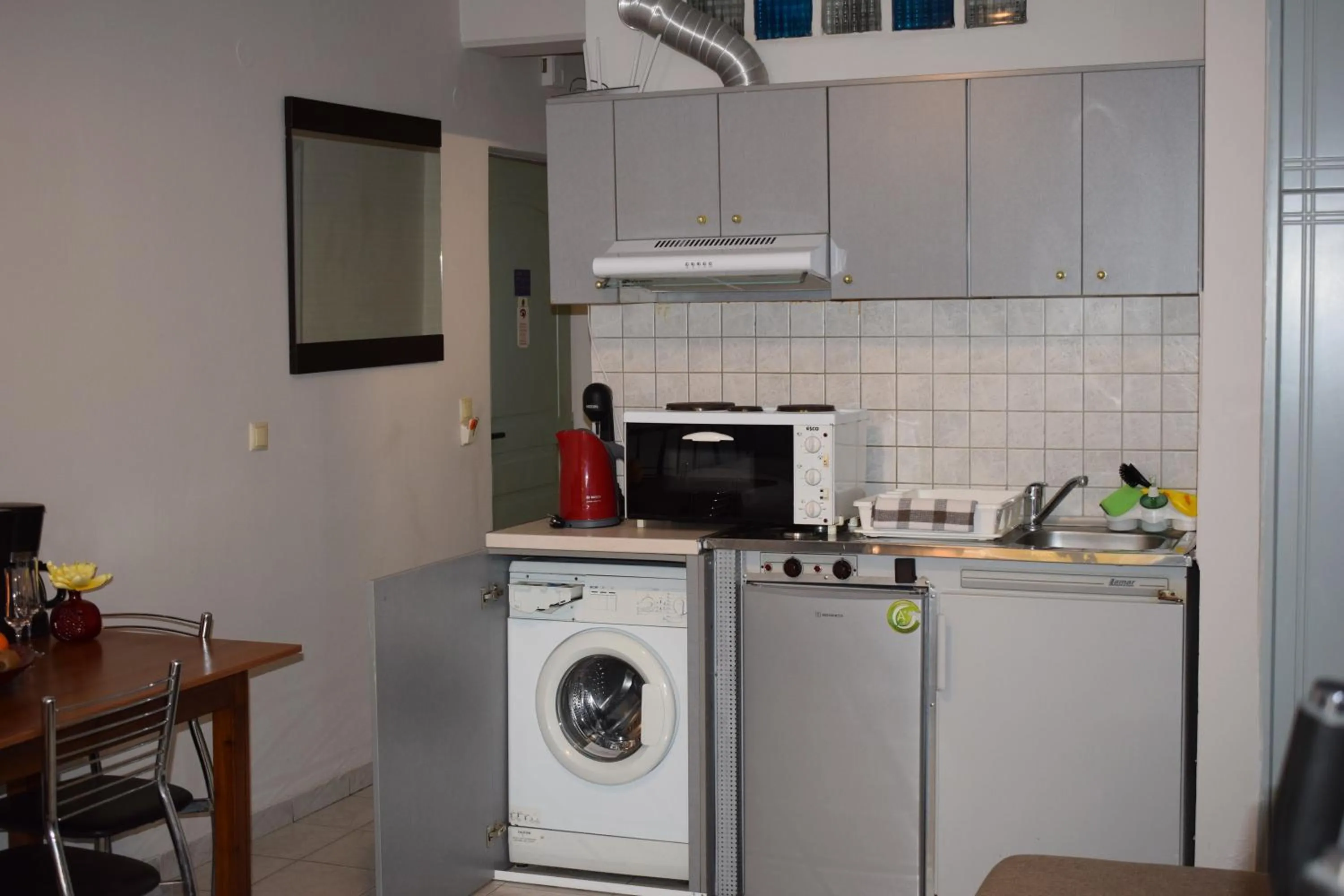 Kitchen or kitchenette in Alena Apartments