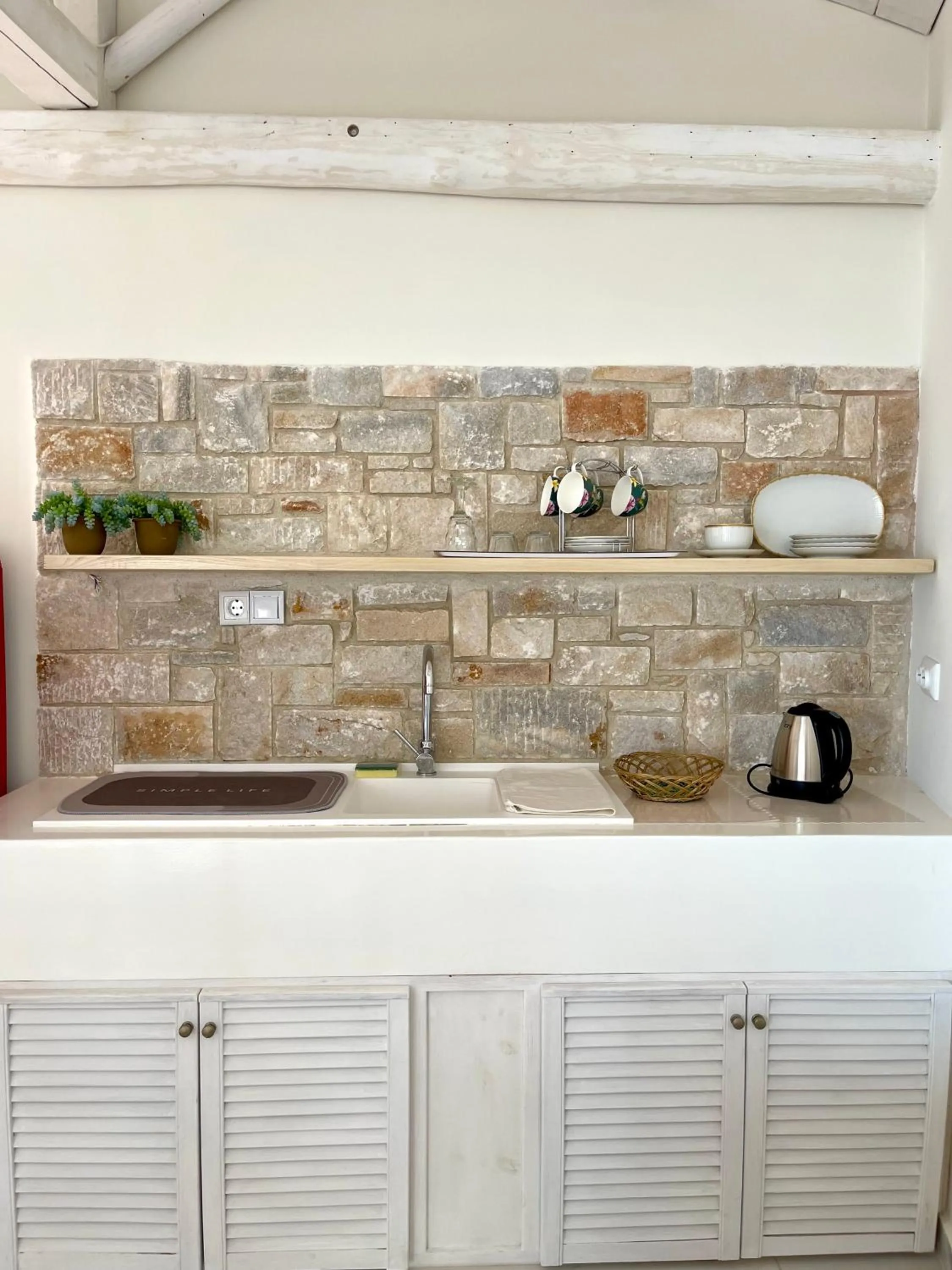 Kitchen or kitchenette in Mare Monte Small Boutique Hotel