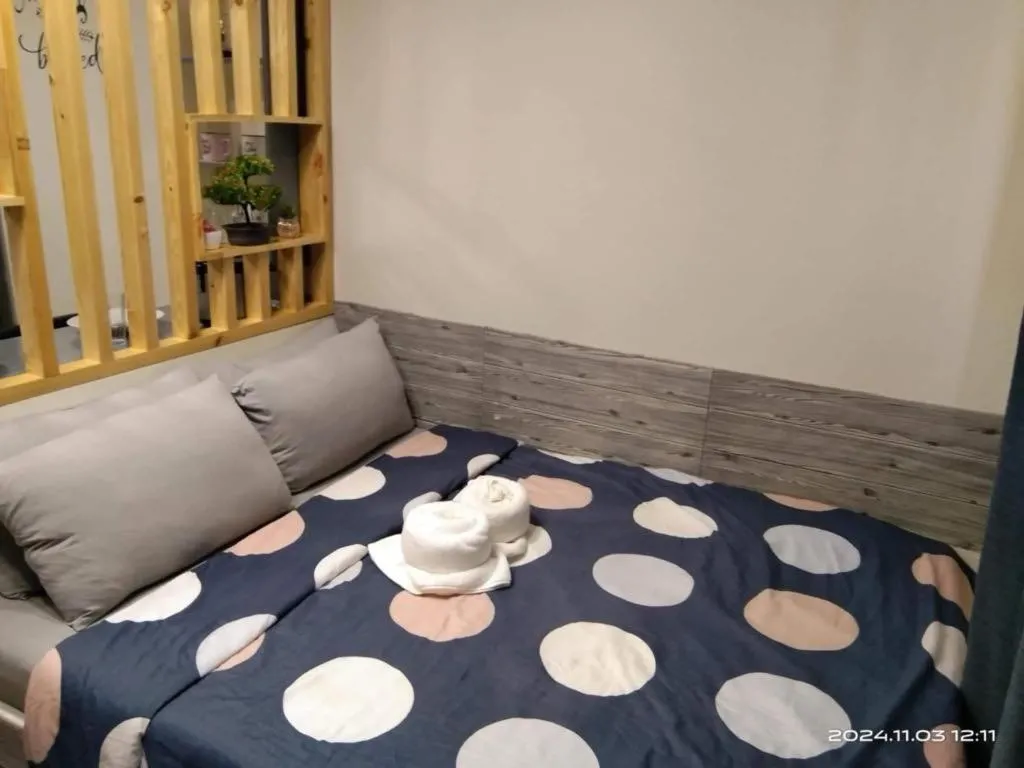 Bed in Alex's Staycation