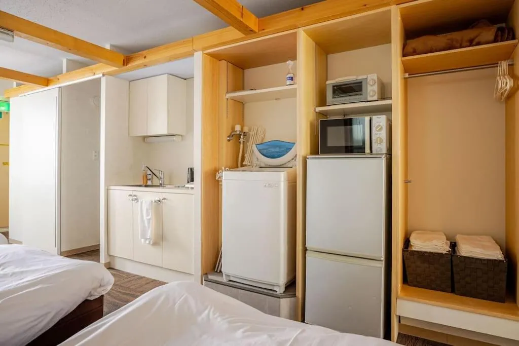 microwave, Bed in Fun Hotel Sapporo