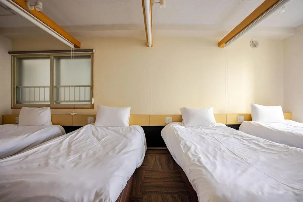 Bed in Fun Hotel Sapporo