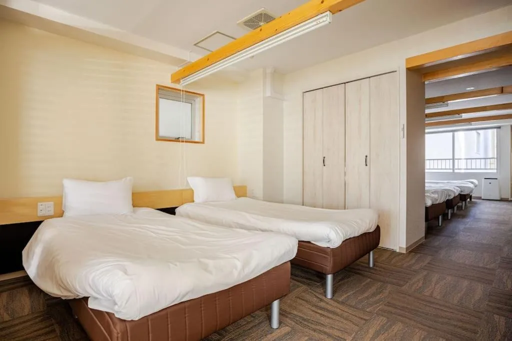 Bed in Fun Hotel Sapporo