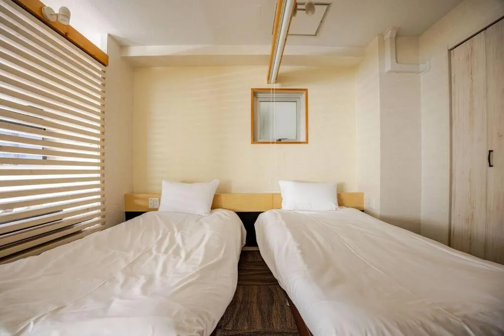 Bed in Fun Hotel Sapporo
