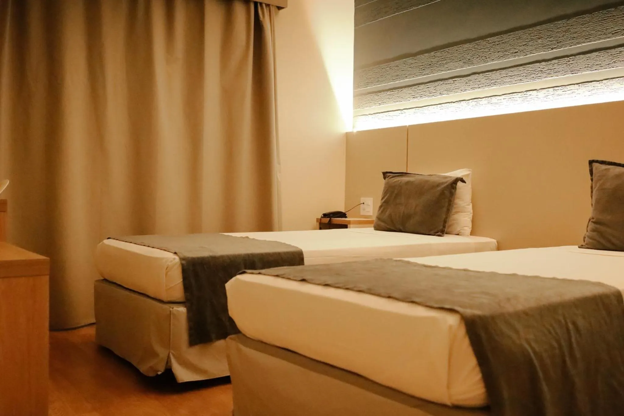 Bed in Carlton Plaza Baobá