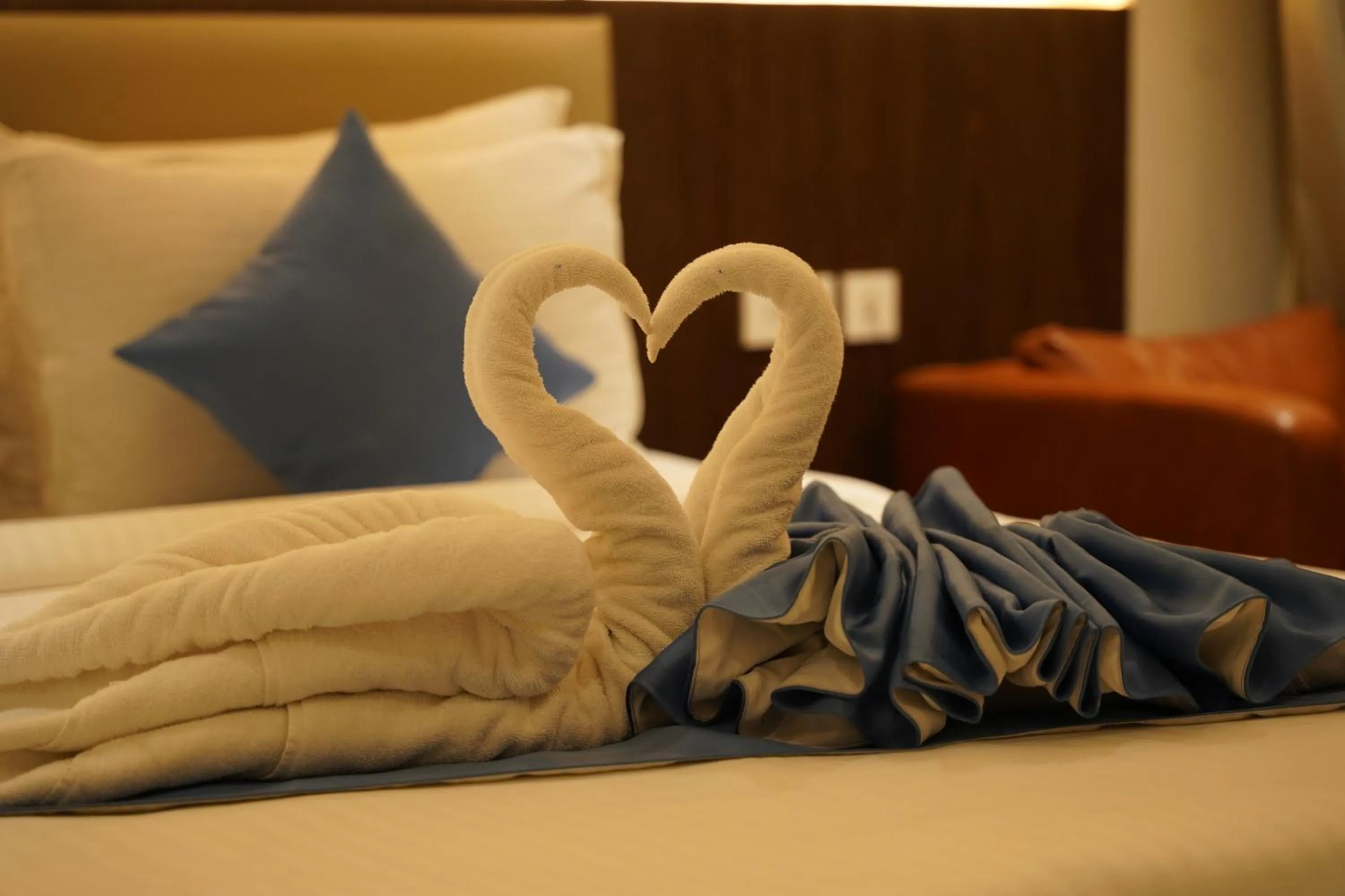 Bed in Clarion Hotel Hyderabad