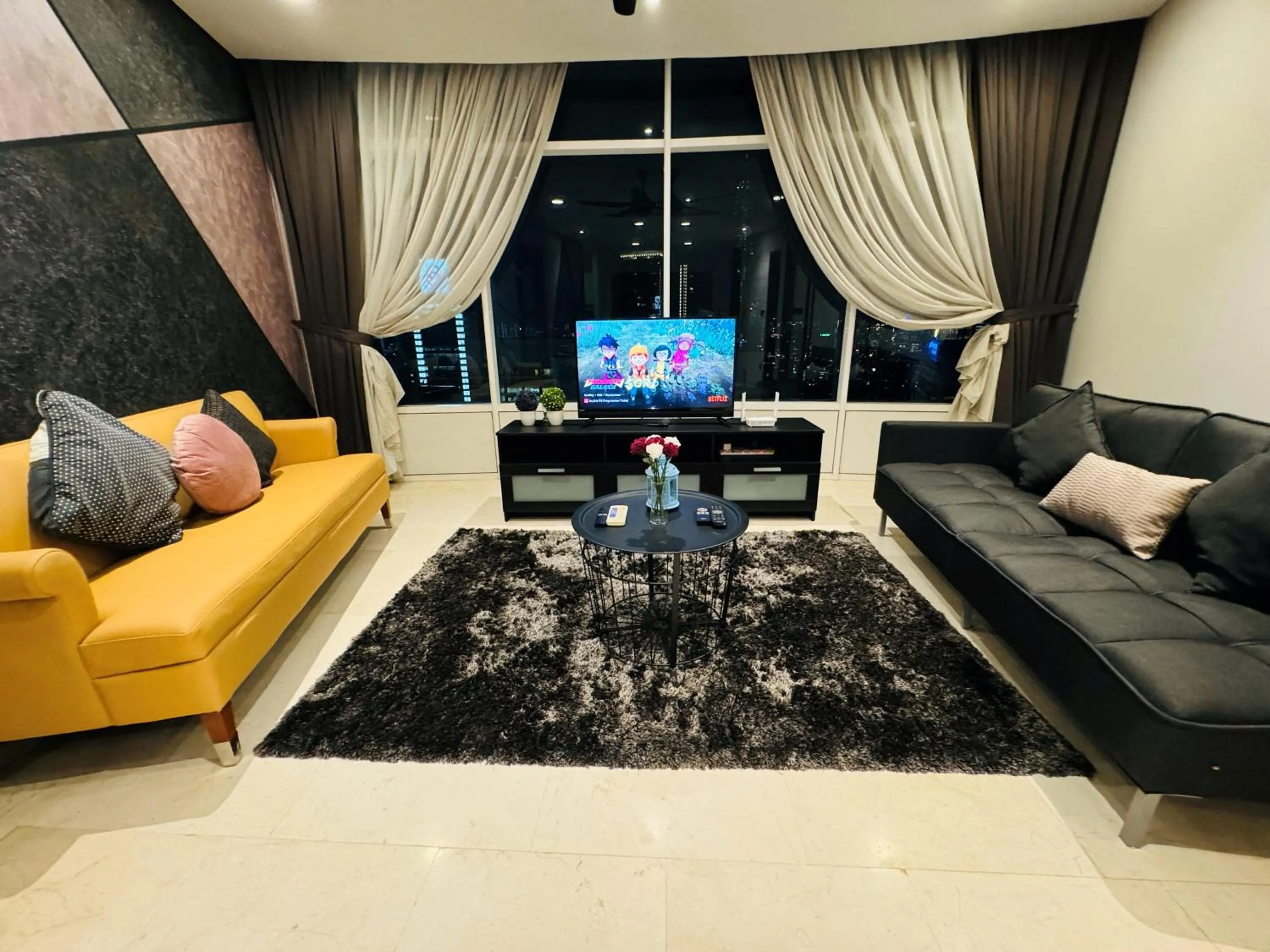 Communal lounge/ TV room in Vortex Suites in Kuala Lumpur
