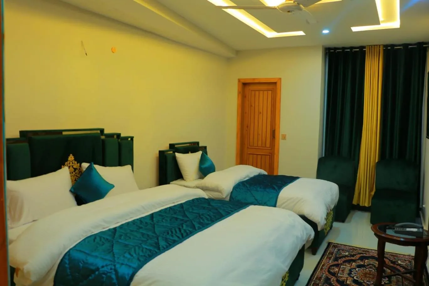 Bed in Hotel Summer Palace Murree