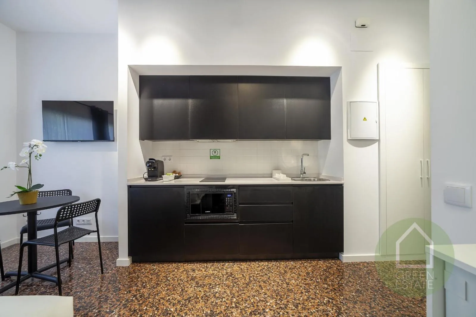 Kitchen or kitchenette in Apartahotel Espai Verd Benimaclet