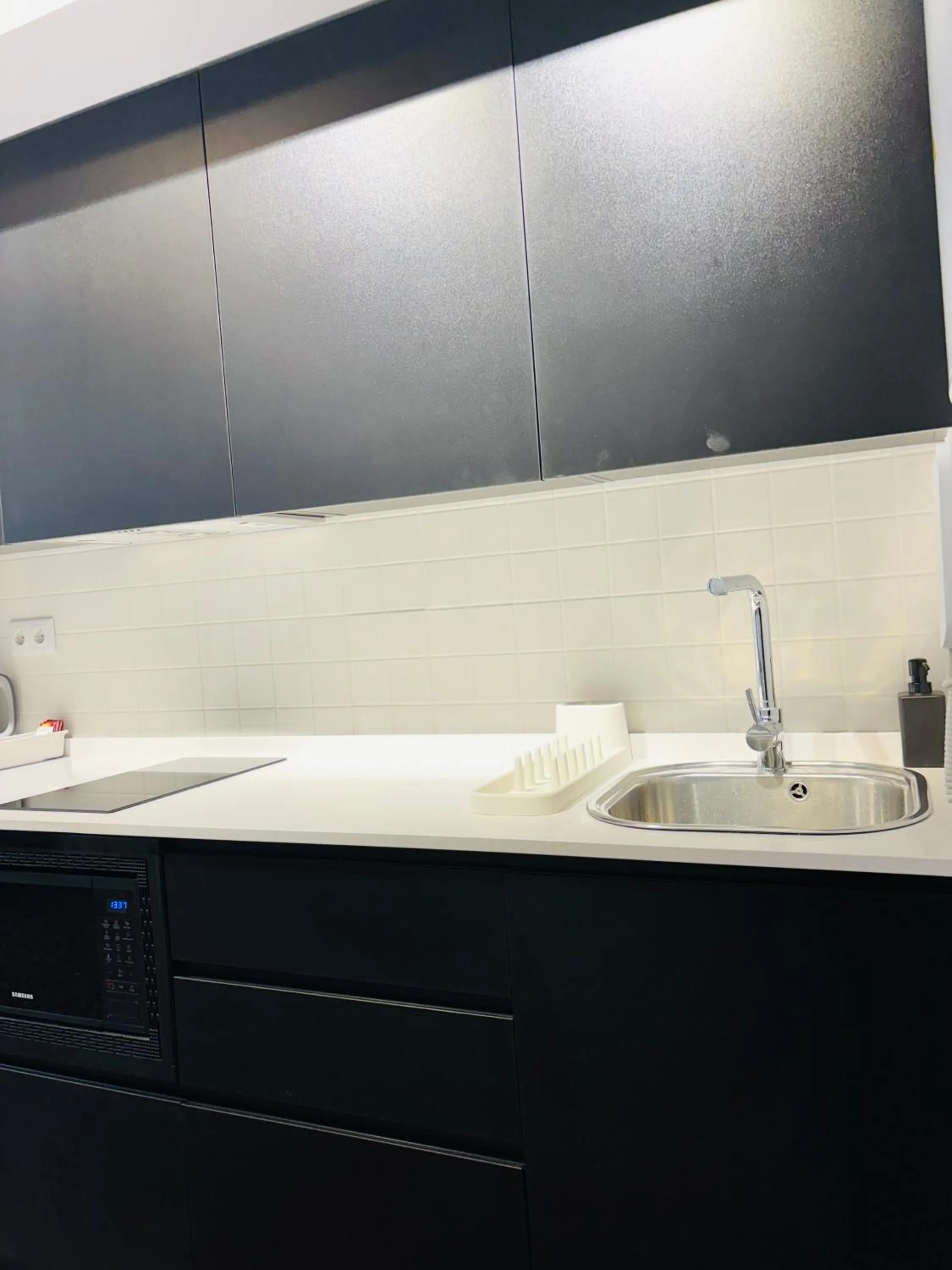 Kitchen or kitchenette in Apartahotel Espai Verd Benimaclet