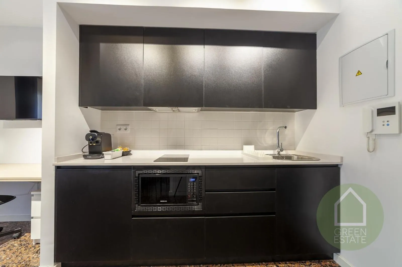 Kitchen or kitchenette in Apartahotel Espai Verd Benimaclet