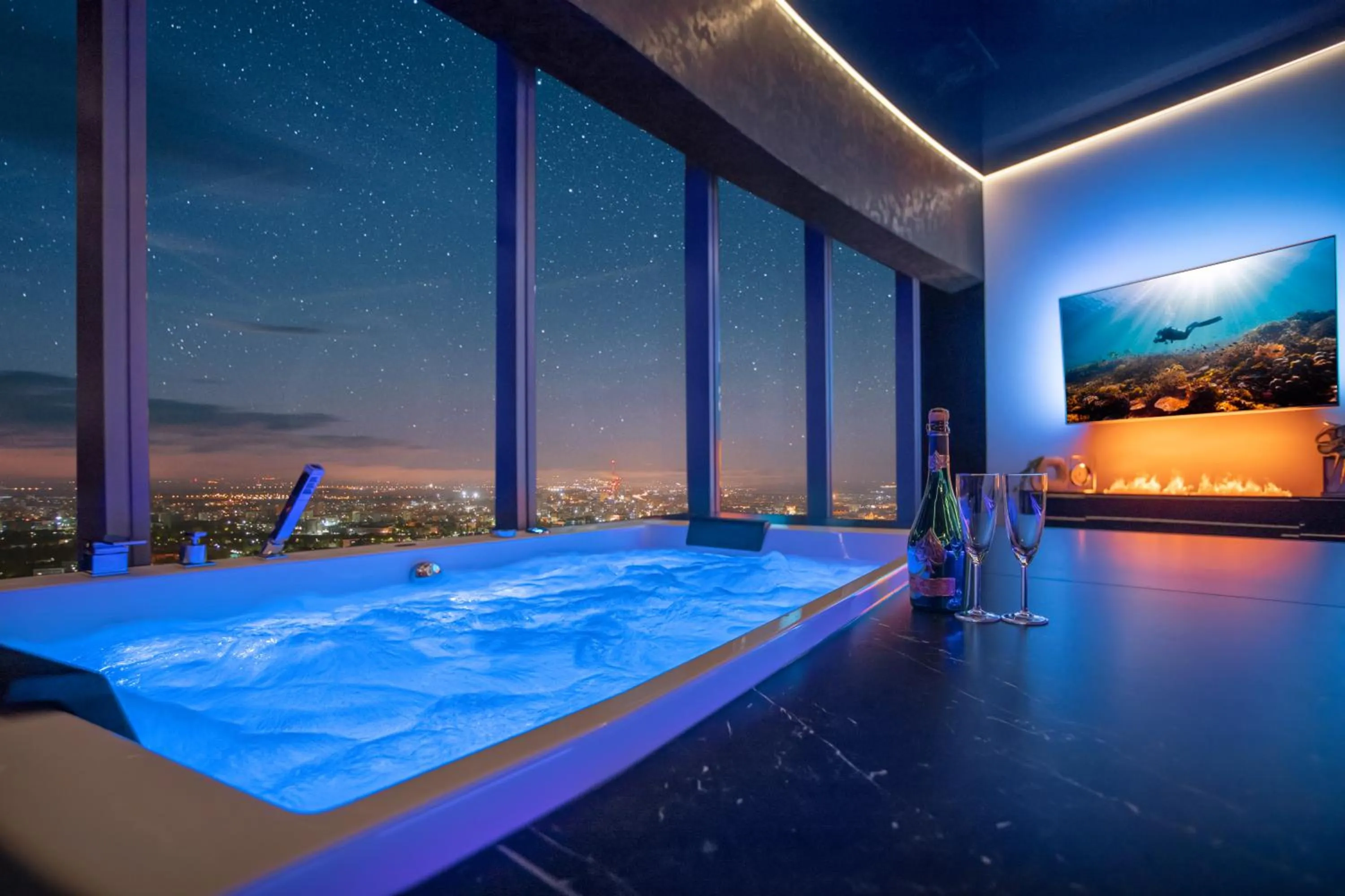 Night in Apartamenty Sky Tower z Jakuzzi Przy Oknie