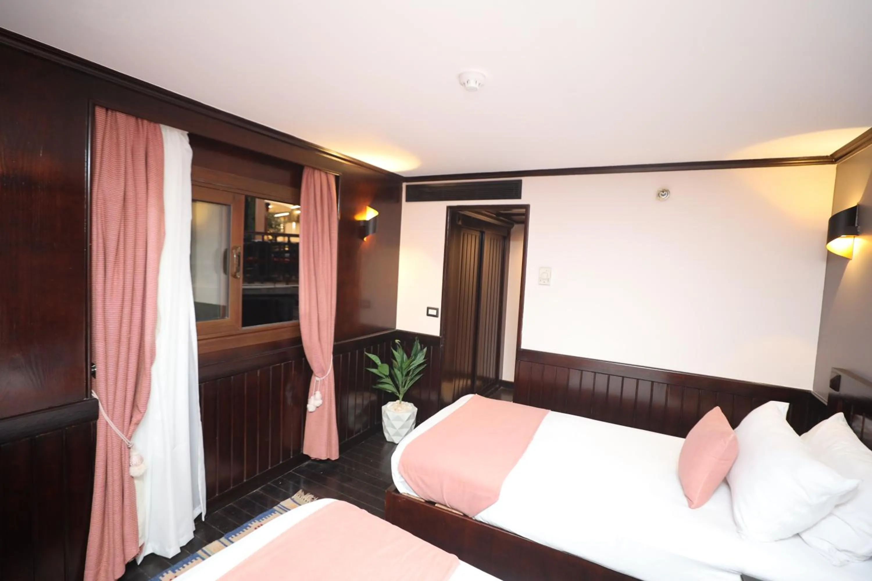 Bed in YOU Nile View Hotel