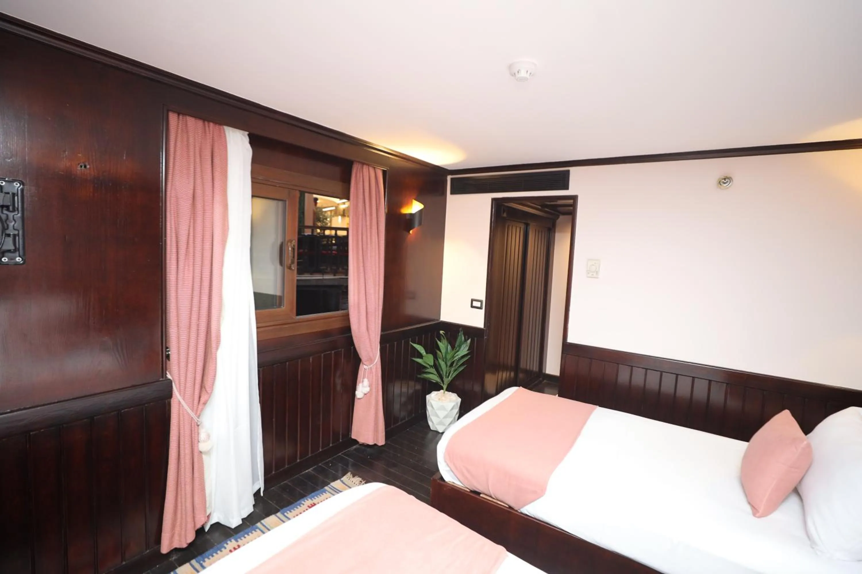 Bed in YOU Nile View Hotel