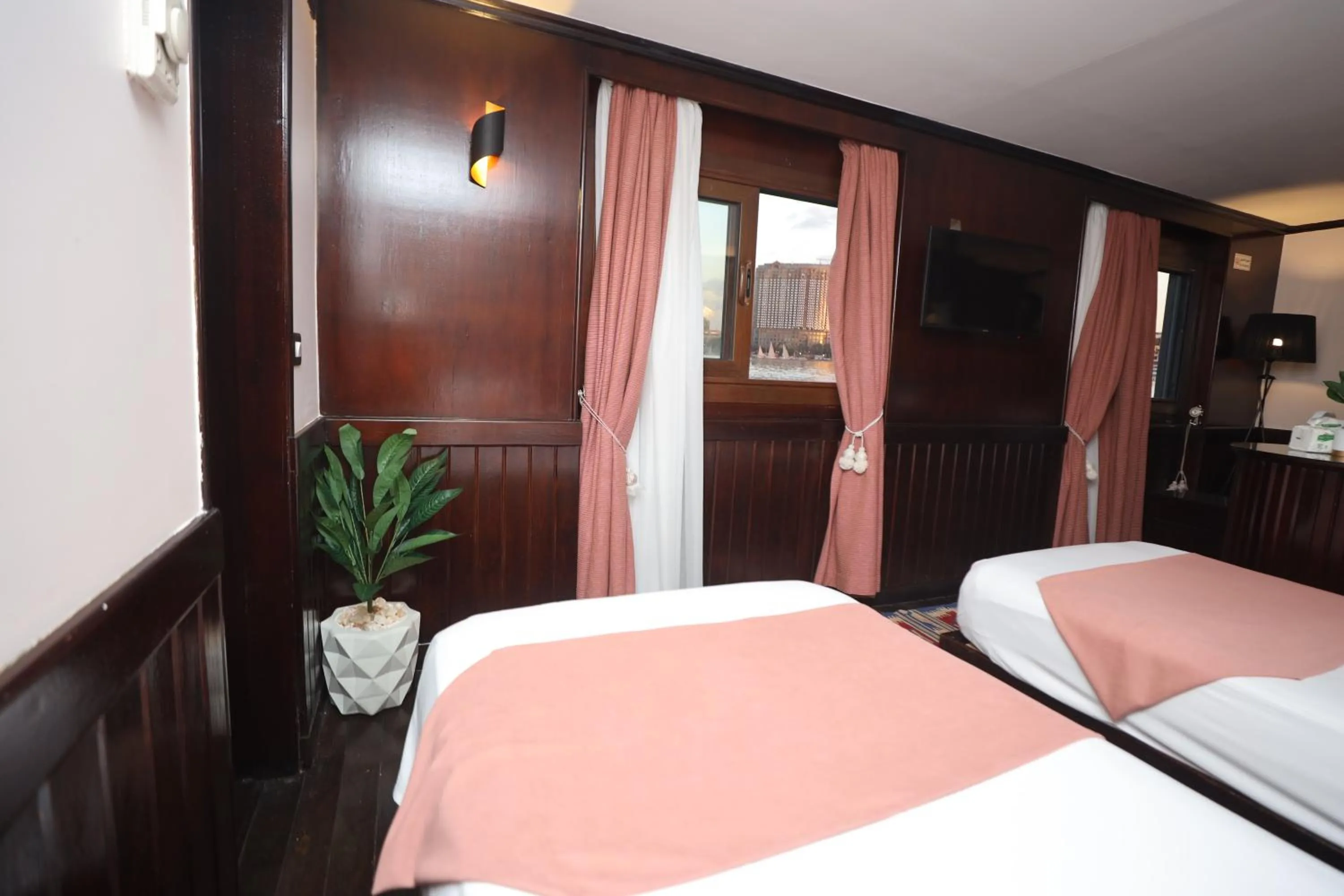 Bed in YOU Nile View Hotel