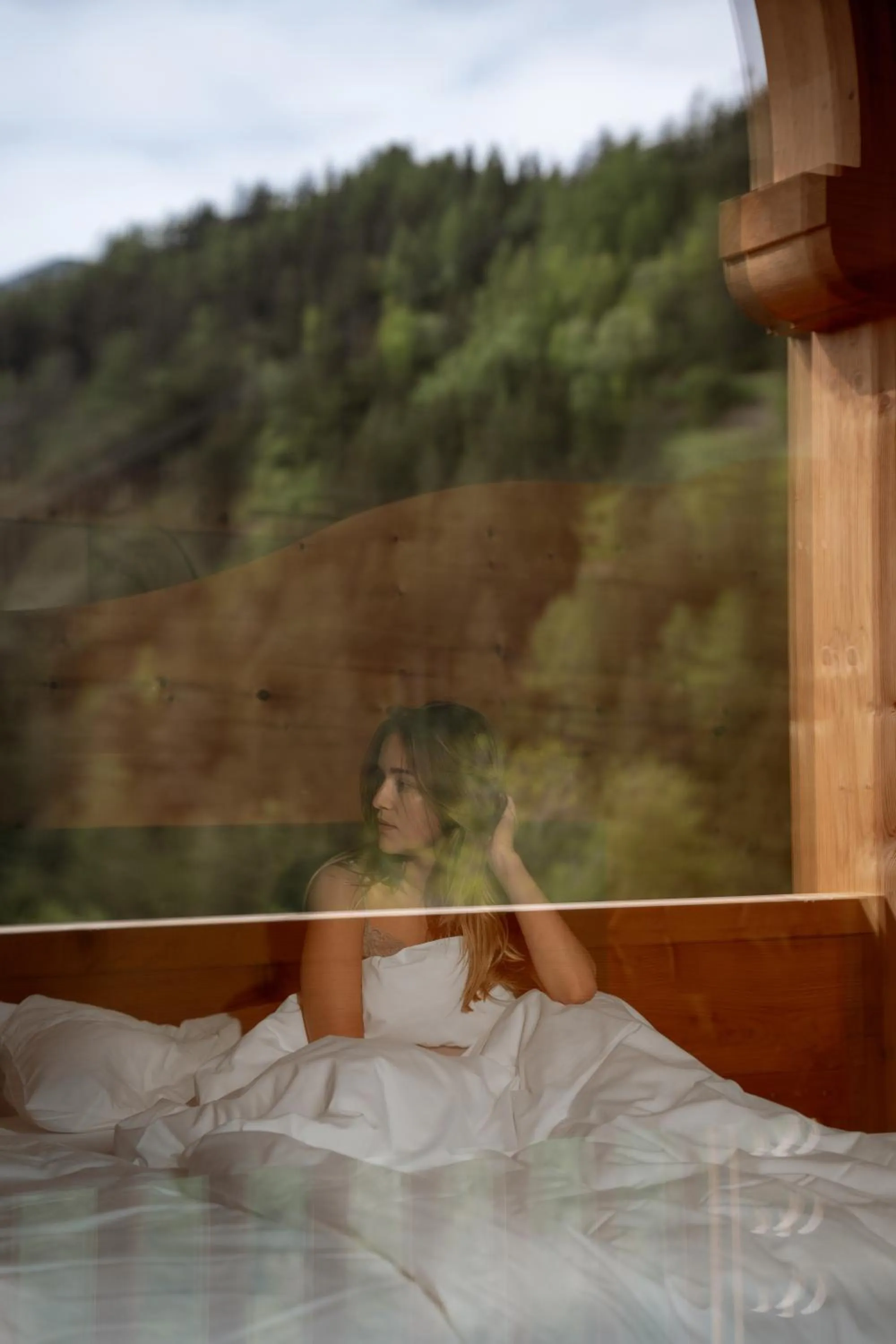 Bed in Naturhotel Lüsnerhof