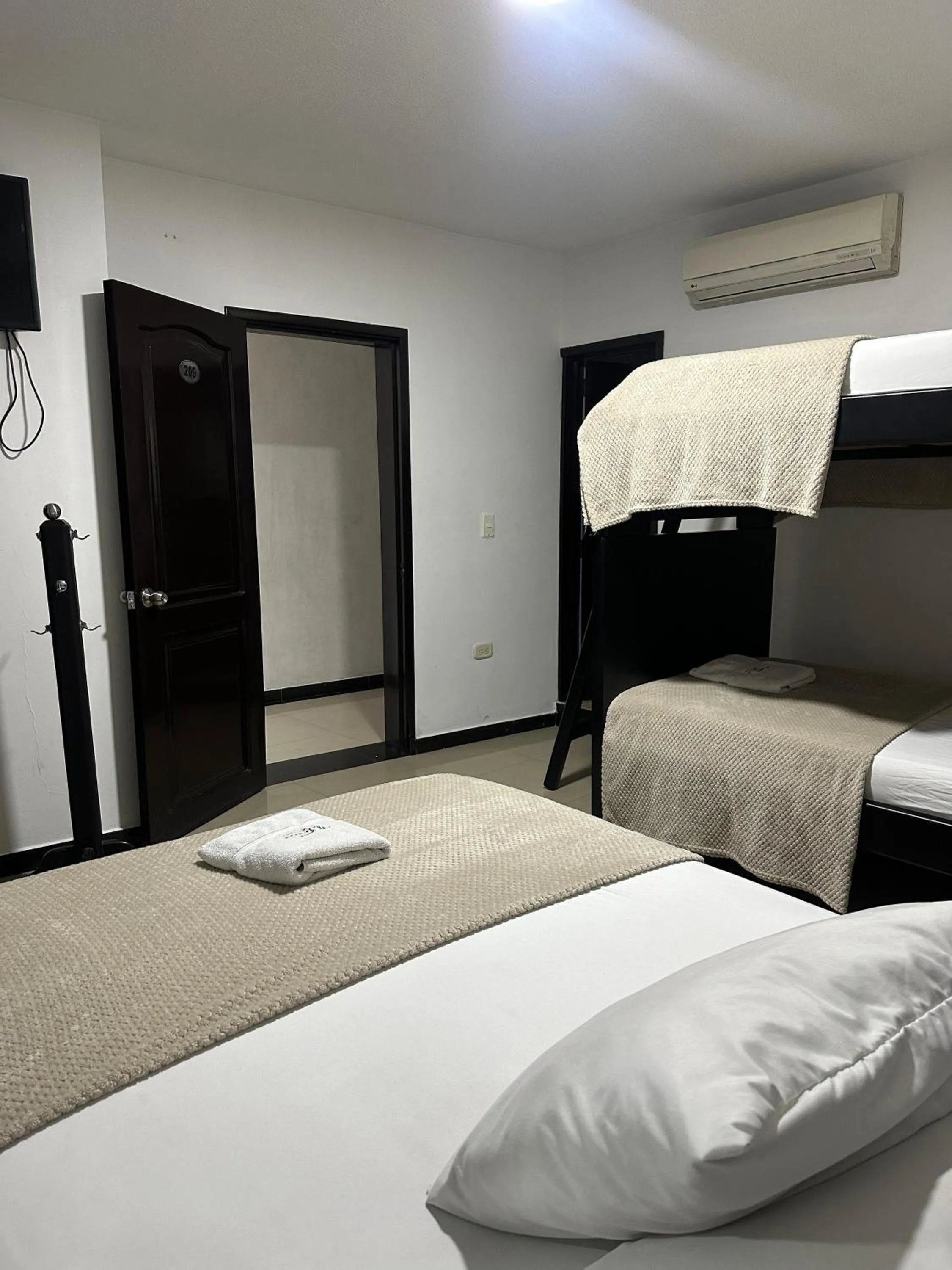 Bed in Hotel Palmeras De Mariana