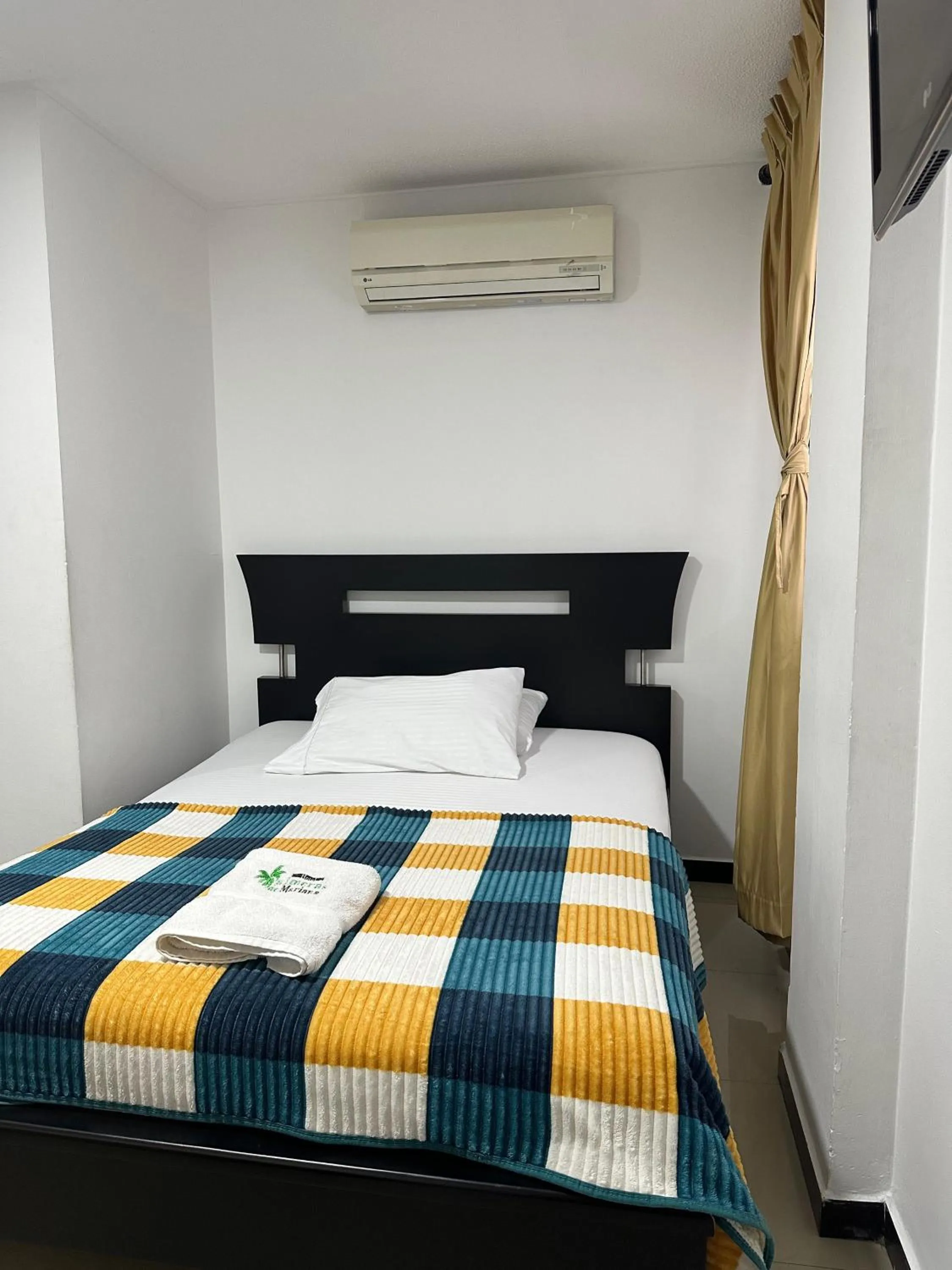 Bed in Hotel Palmeras De Mariana