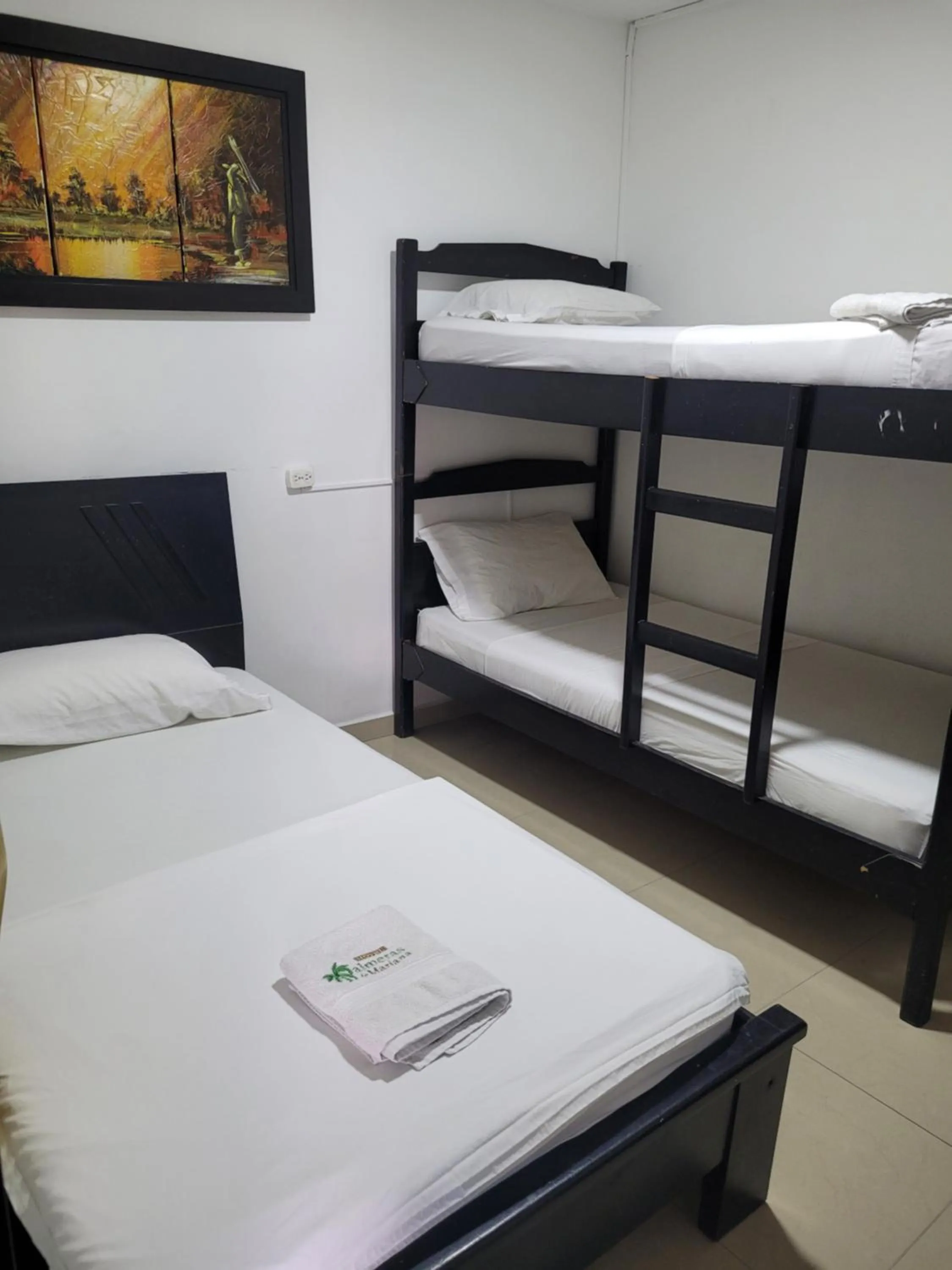 Bed in Hotel Palmeras De Mariana