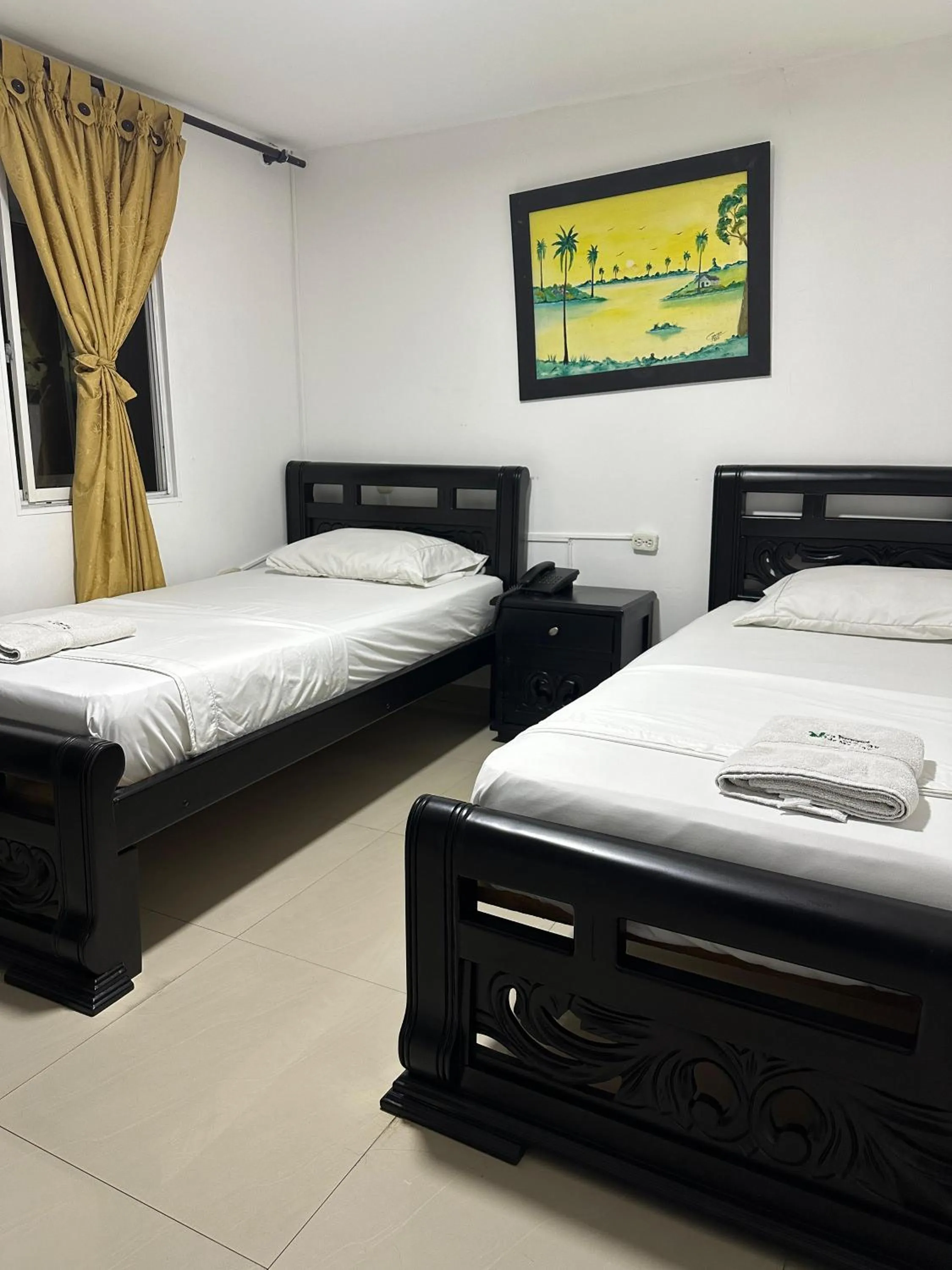 Bed in Hotel Palmeras De Mariana