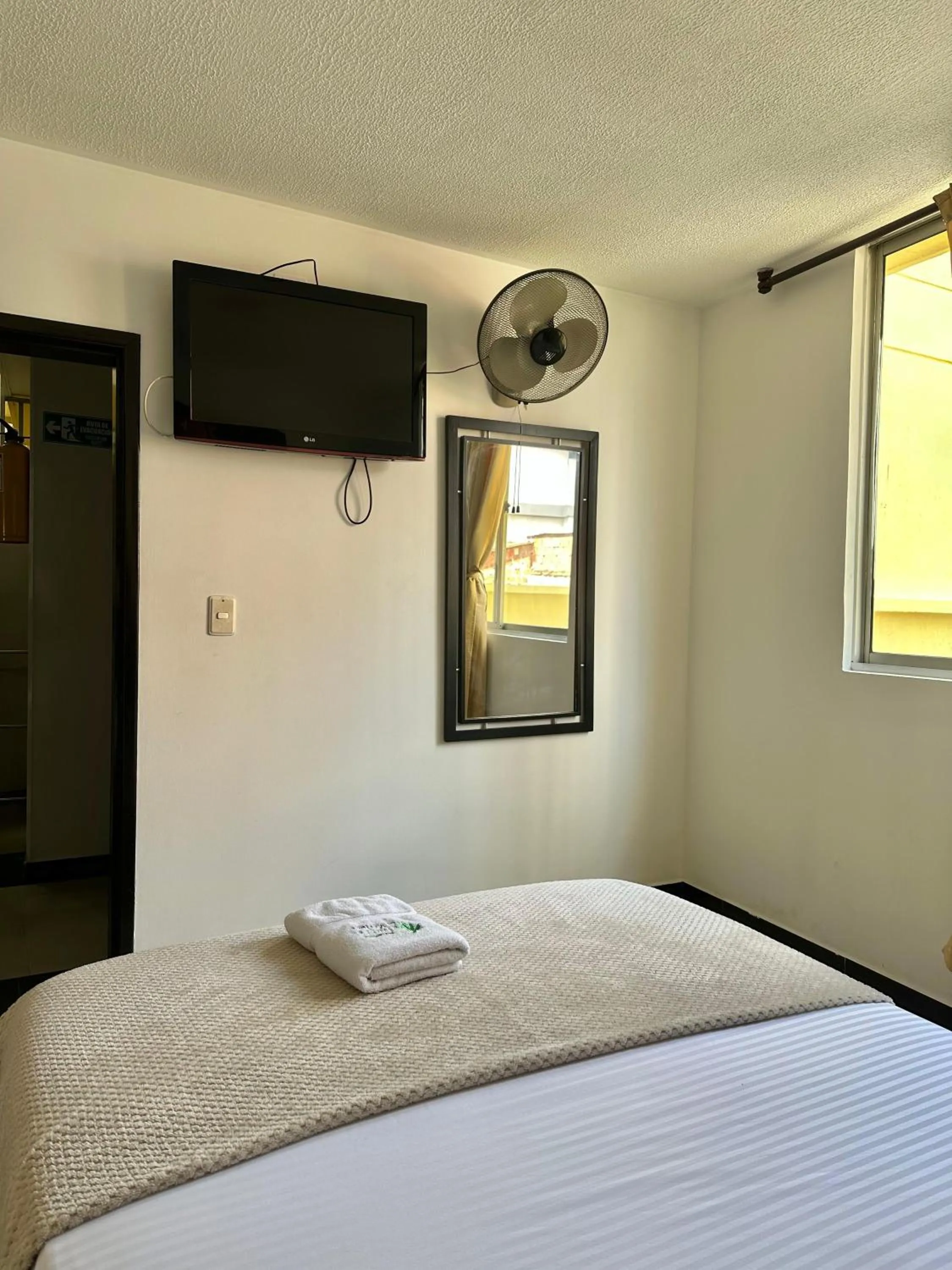 Bed in Hotel Palmeras De Mariana