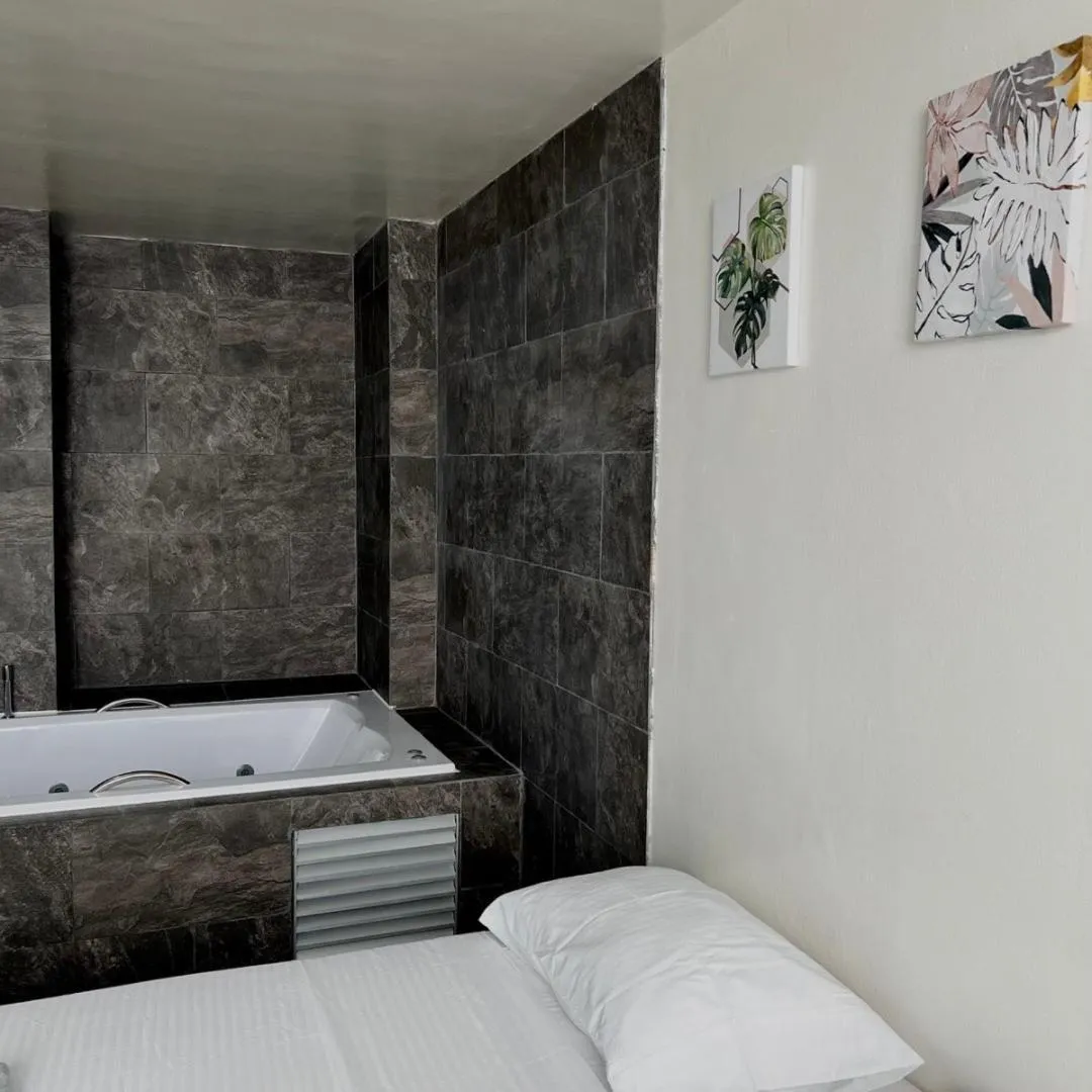 Bed in Hotel Villa Nueva Comfort