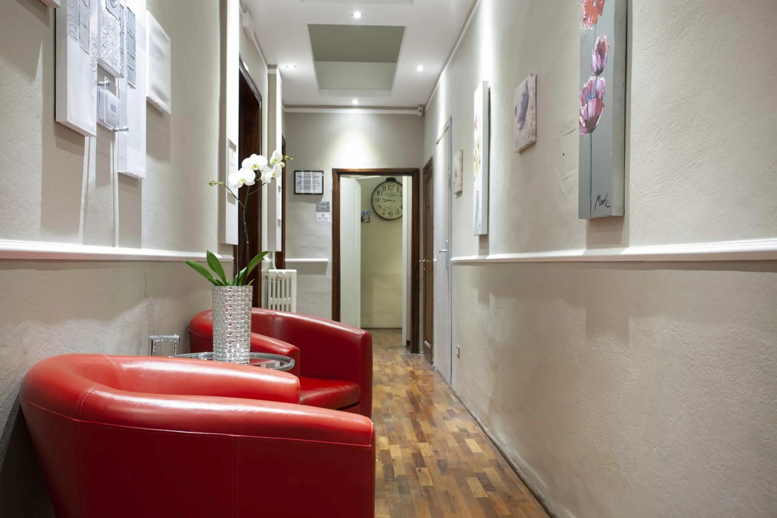 Communal lounge/ TV room in B&B Prestigia Rooms