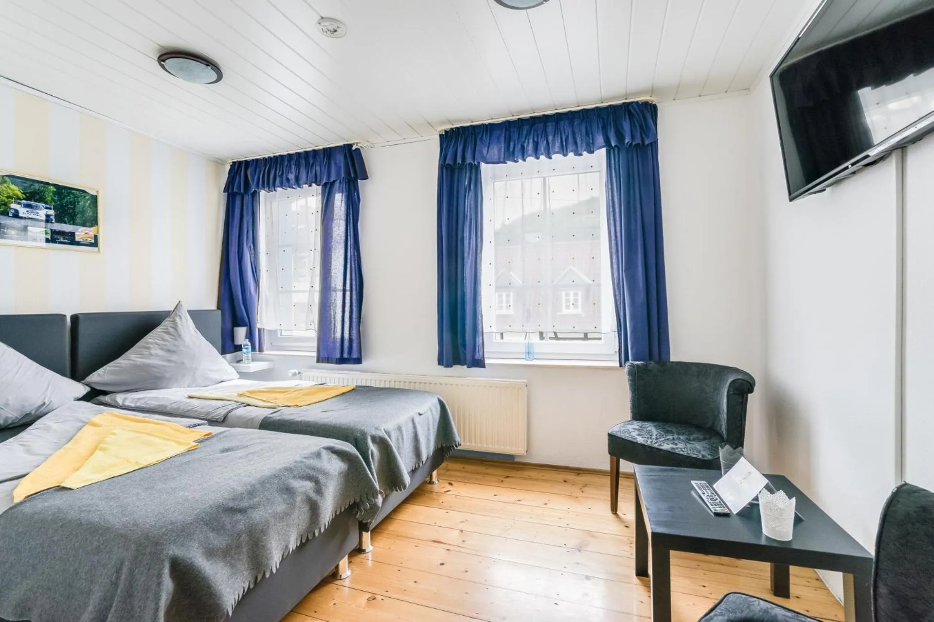Photo of the whole room, Bed in Nurburgring Rooms Pinocchio
