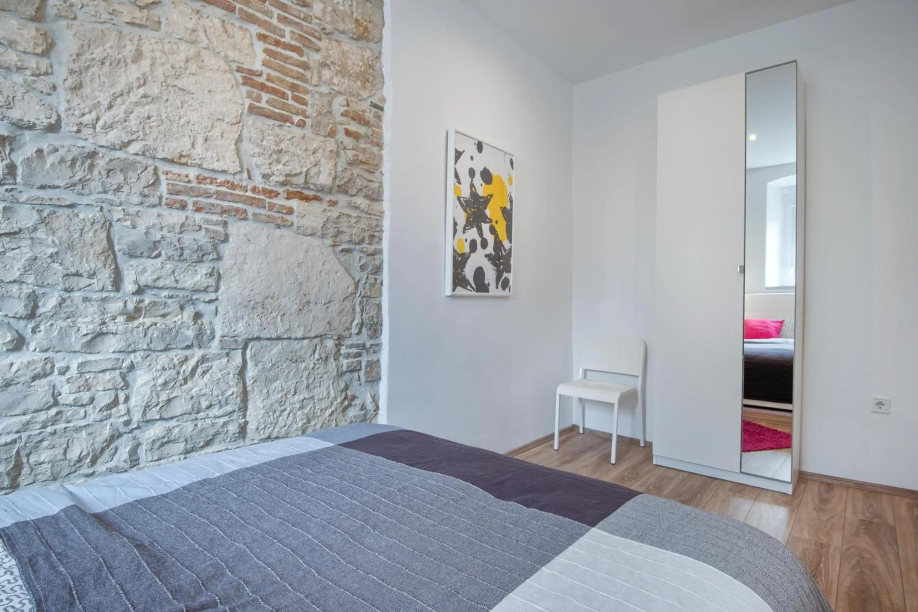 Photo of the whole room, Bed in Top Center Rooms & Studio