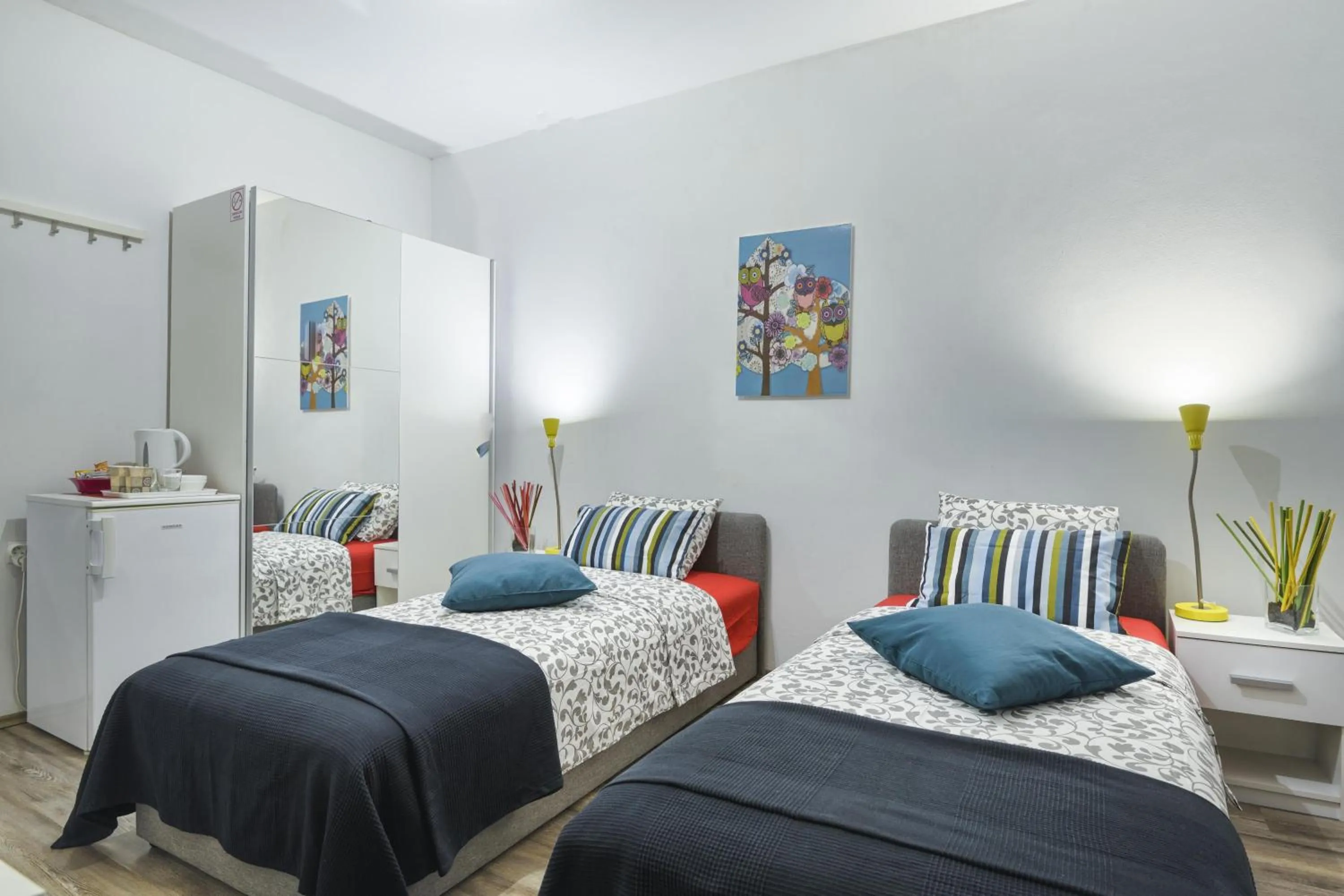 Photo of the whole room, Bed in Top Center Rooms & Studio