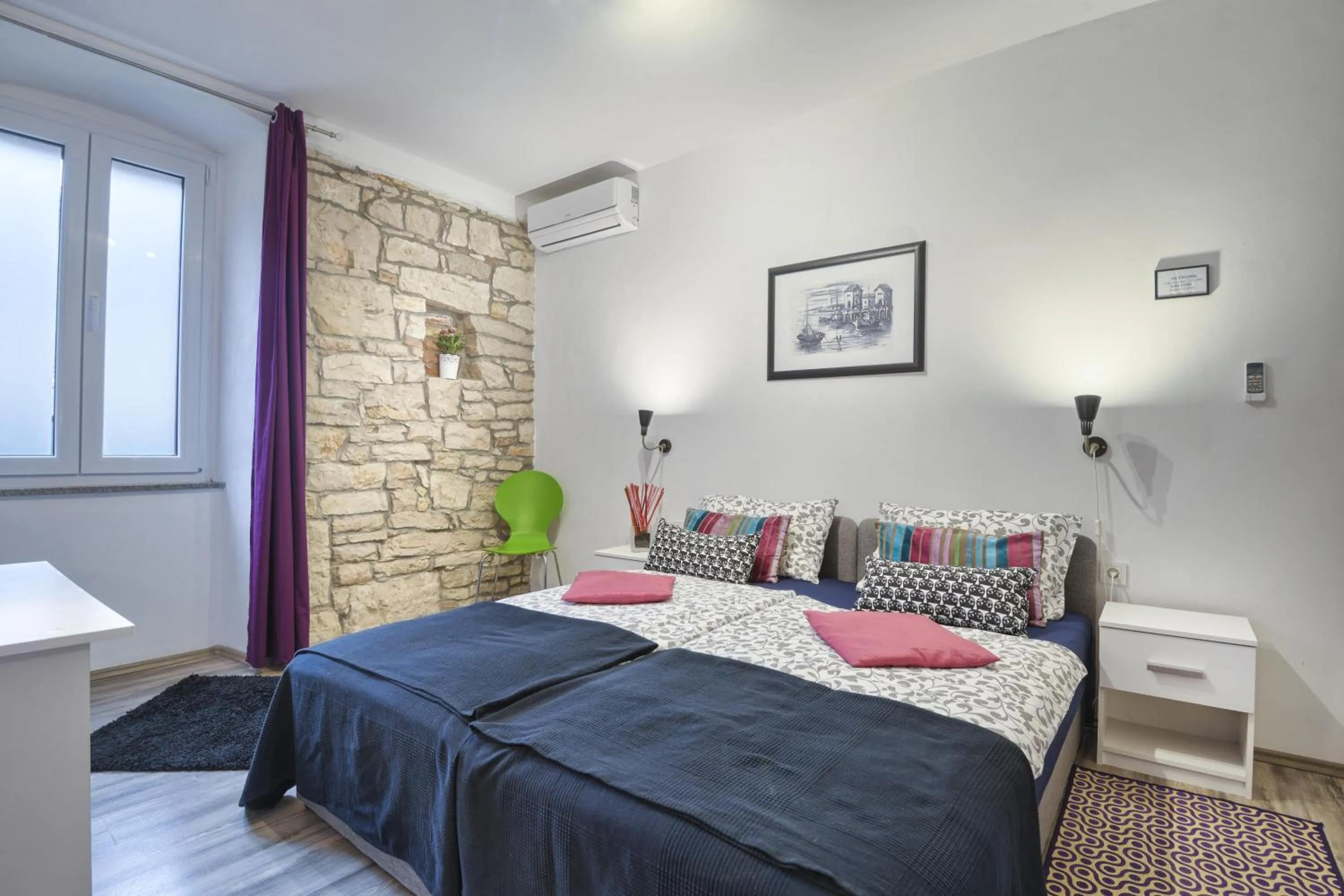 Photo of the whole room, Bed in Top Center Rooms & Studio