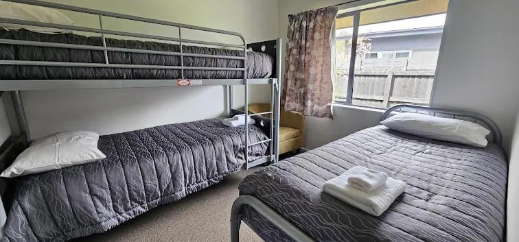 Bed in Westport Kiwi Holiday Park & Motels
