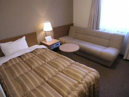 Bed in Ryugasaki Plaza Hotel Shinkan