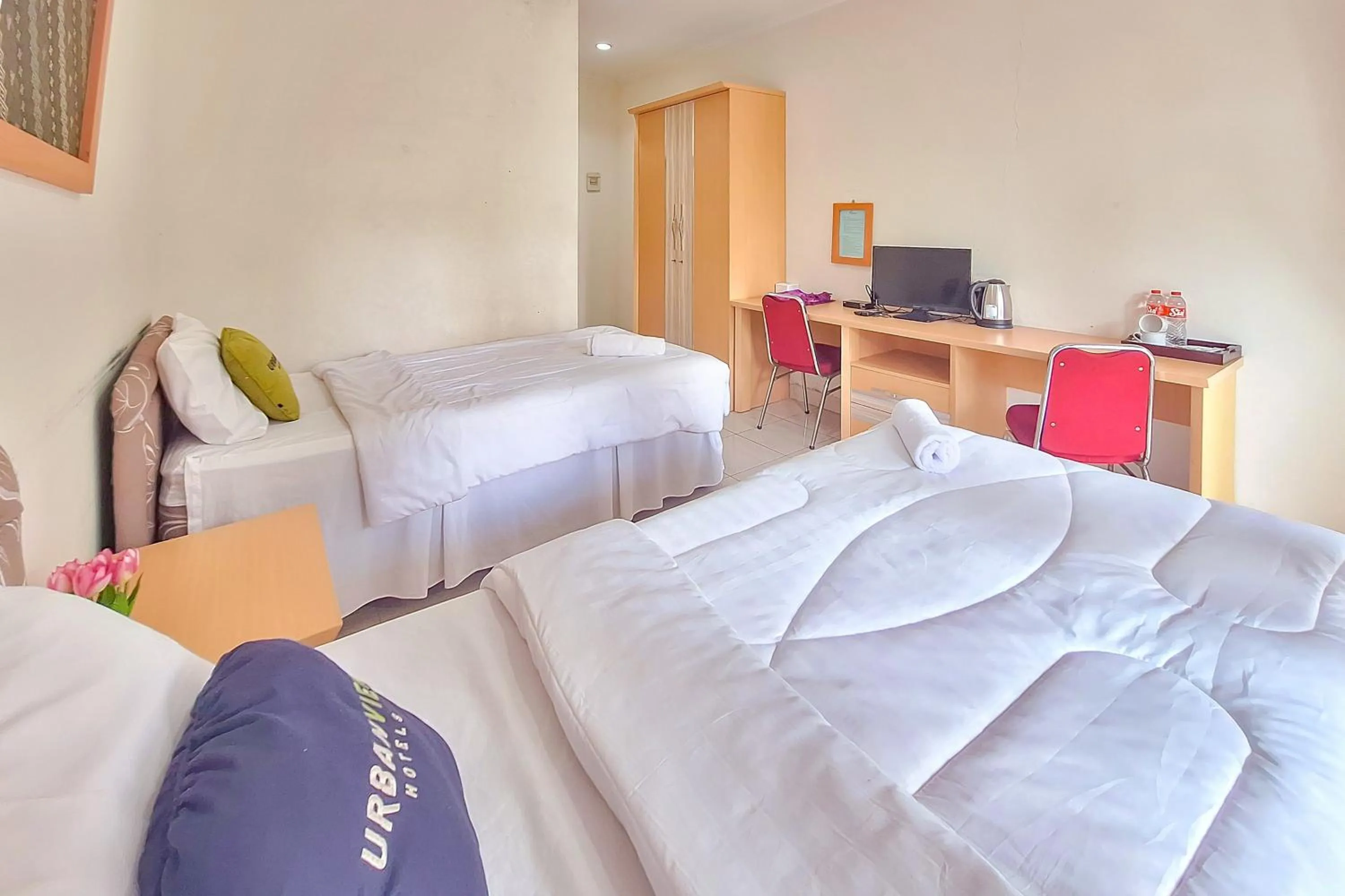 Bedroom, Bed in Urbanview Hotel Tridaya Cisarua Puncak