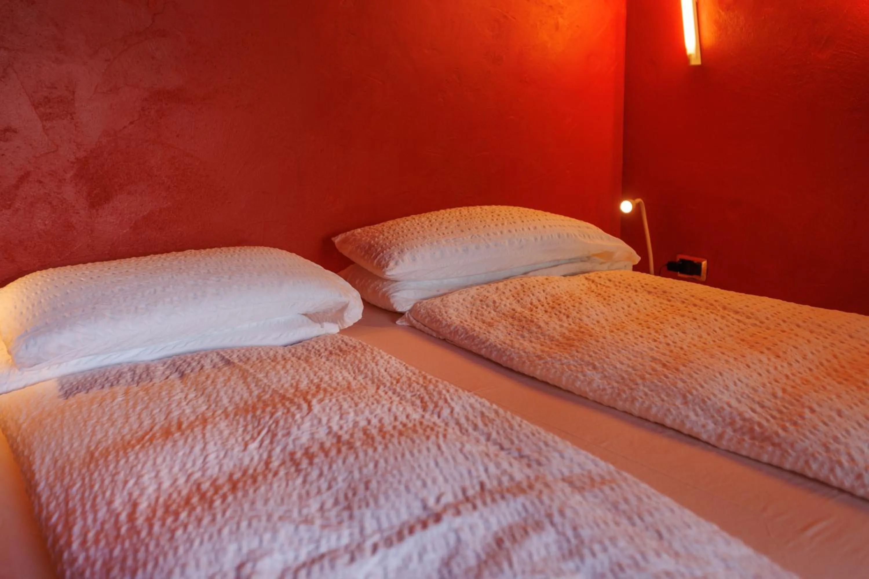 Bed in Ambienthotel PrimaLuna 3S