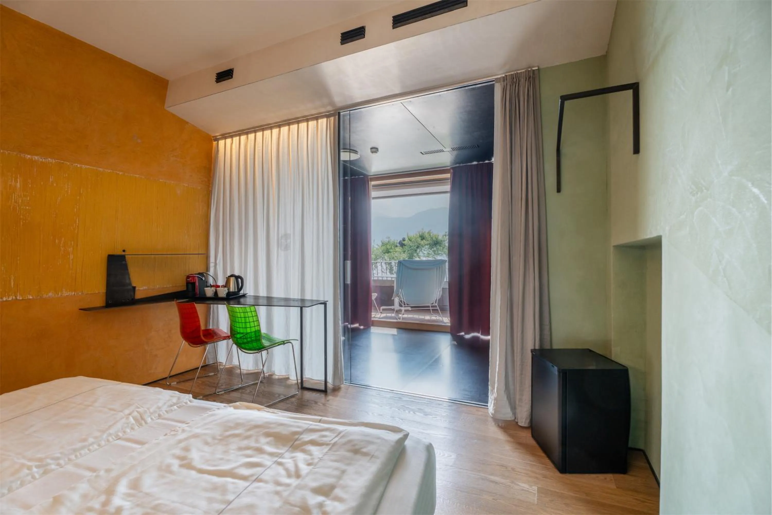 Living room, Bed in Ambienthotel PrimaLuna 3S